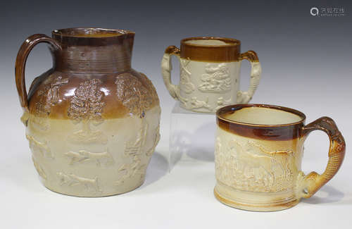 A large brown stoneware hunting jug, 19th century, typically sprigged with huntsmen and hounds