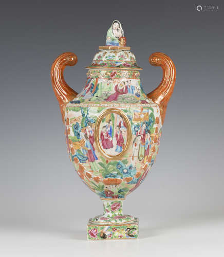 A Chinese Canton famille rose enamelled export porcelain urn and cover, early 19th century, the body