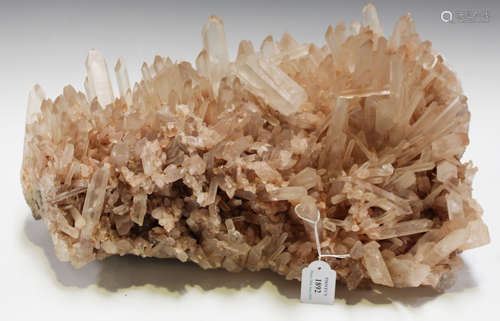 A large quartz crystal cluster specimen of pink tone, length 45cm.Buyer’s Premium 29.4% (including