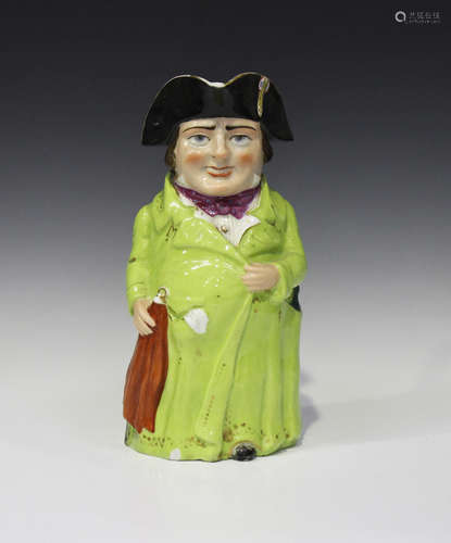 A satirical Continental porcelain character jug, mid to late 19th century, modelled as Napoleon