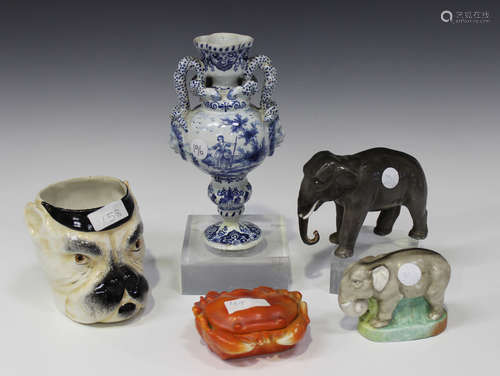 Four pieces of Continental porcelain, late 19th/early 20th century, comprising two elephant