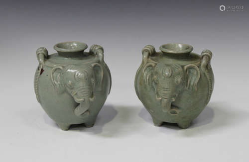 A pair of Thai celadon glazed pottery zoomorphic pots, each of swollen elephant form, height 11.