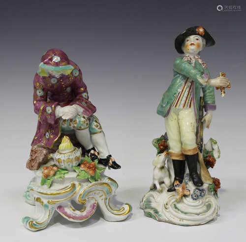 A Bow porcelain figure of Winter, circa 1760-76, modelled as a seated man wearing a hooded jacket