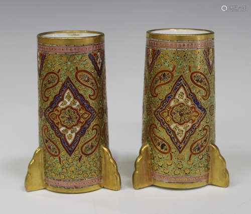 A diminutive pair of Coalport Cashmere pattern spill vases, 1880s, the richly gilded and enamelled