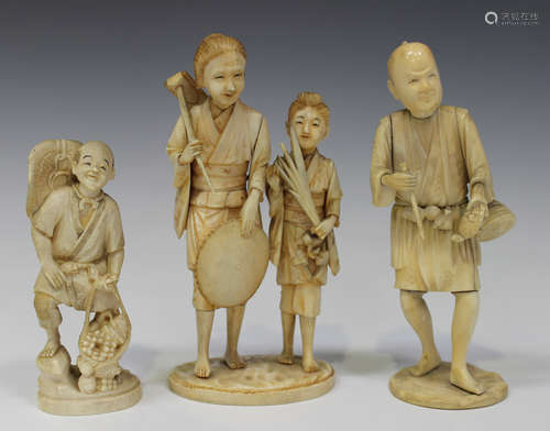 A Japanese carved ivory okimono figure, Meiji period, of a man carrying an overladen fruit basket