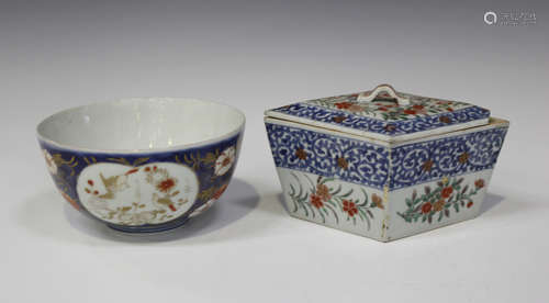 A Japanese Imari circular bowl, 18th century, the exterior painted and gilt with panels of birds and