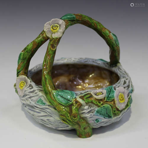 A Royal Worcester majolica Rustic basket, circa 1865-1870, of circular form, moulded as