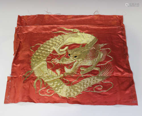 A Chinese red silk and gilt thread embroidered square panel, 20th century, worked with a coiled