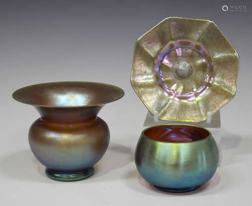 An iridescent glass vase, probably WMF Myra art glass, late 1920s, of spittoon shape on a small