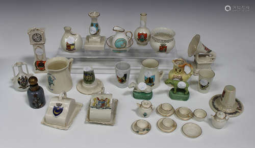 A mixed collection of mostly crested china and other miniatures, including a miniature Goss teapot