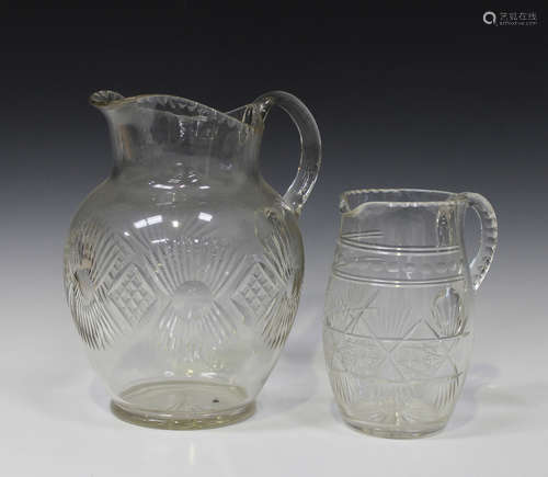 A large cut glass jug, mid-20th century, cut with large stylized flowerheads, interspaced with