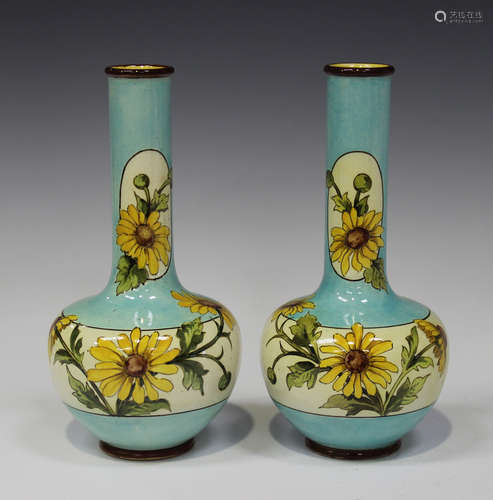 A pair of Doulton Lambeth faience bottle vases, circa 1873-91, decorated by Elizabeth Shelley,