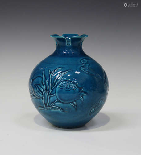 A Chinese turquoise glazed porcelain vase, mark of Qianlong but 20th century, the globular body