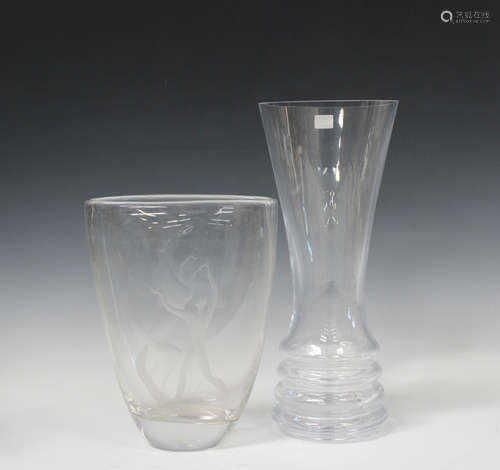 A Kosta glass vase, mid-20th century, the clear flattened oval body engraved with a figure by a