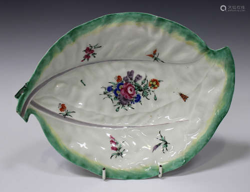 A Worcester porcelain leaf dish, circa 1760, modelled as two overlapping leaves, their crossed