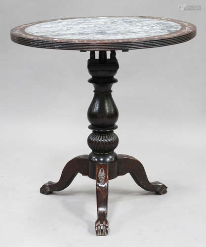 A Chinese hardwood tip-top wine table, late 19th century, the circular top inset with a grey