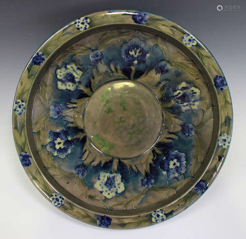 A large Moorcroft pottery Florian Ware circular bowl, dated 1918, the flared sides with upright rim,