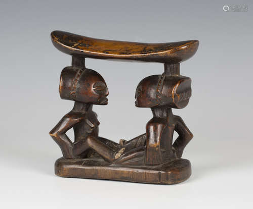 A Luba carved hardwood headrest, Democratic Republic of Congo, probably late 19th/early 20th