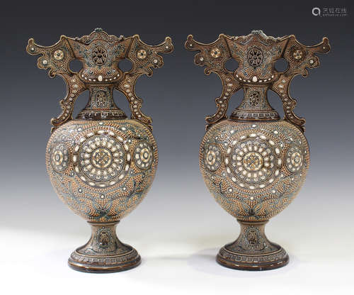 A pair of Gerbing & Stephan majolica two-handled vases, late 19th century, each ovoid body decorated