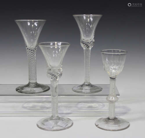 A single series opaque twist stem wine glass, circa 1770, the ogee bowl moulded with flutes above