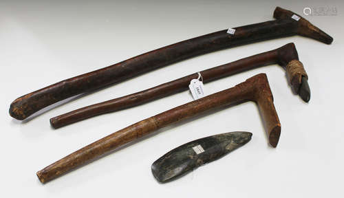 A Solomon Islands digging tool, the head fitted with a rattan bound stone adze, bearing 'F.S.