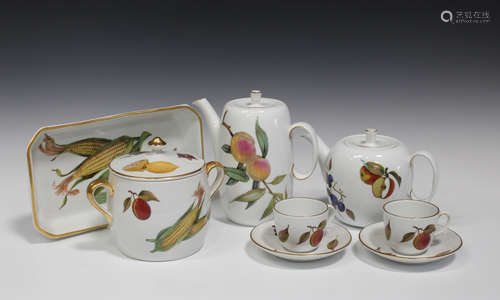 A collection of Royal Worcester porcelain Evesham pattern tableware, including two teapots and