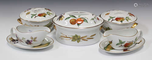 A collection of Royal Worcester Evesham pattern dinner wares, including two circular tureens and