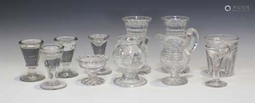 A small group of glassware, 19th century, including a Powell type clear vase of bulbous shape with