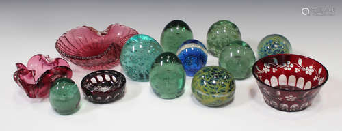 Six soda glass paperweights, 19th century, including four with internal flower arrangements,