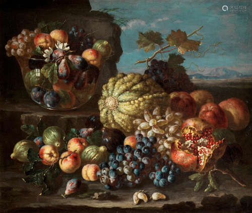 Peaches, figs and plums on a silver dish beside a tazza of sweetmeats, grapes and wine; and A melon, grapes, peaches and pomegranates before a glass bowl of fruit, a landscape beyond  (2) Pietro Navarra(active Rome, 17th and 18th Centuries)