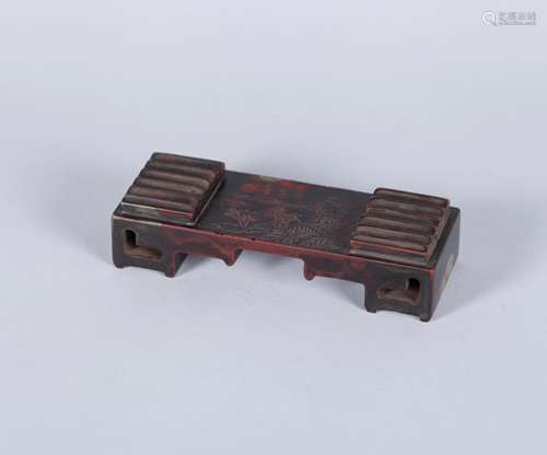 A Chinese Carved Duan Stone Ink Cake Rest