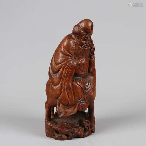 A Chinese Carved Bamboo Figure of Buddha Decoration