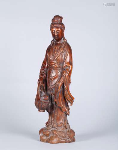 A Chinese Carved Agarwood Buddha