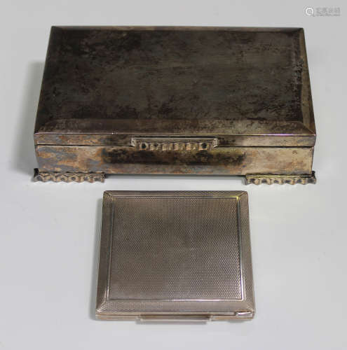 A sterling rectangular cigarette box with hinged lid, length 16cm, together with a silver square