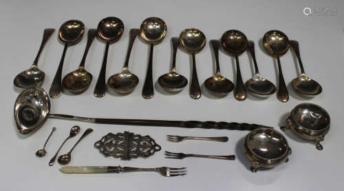 A small group of silver and plated items, including a two-section nurse's buckle with pierced