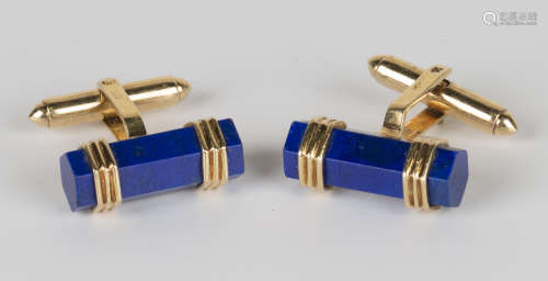 A pair of gold and lapis lazuli cufflinks, each front mounted with a hexagonal lapis lazuli baton,