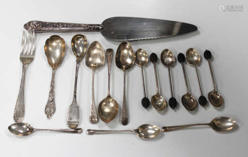 A small collection of silver cutlery, including a set of six bean end coffee spoons, Sheffield 1924,