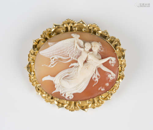 A Victorian gold mounted oval shell cameo brooch, circa 1840, carved as a figure of an angel and