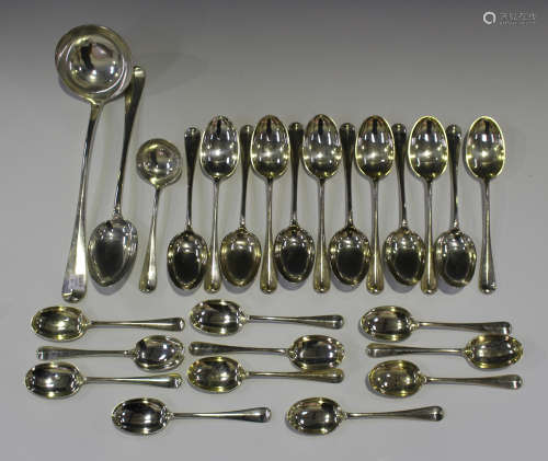 An Edwardian silver part canteen of Hanoverian Rat Tail pattern cutlery, comprising soup ladle,