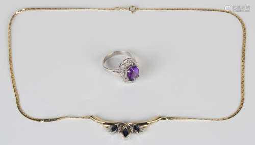 A 9ct gold, sapphire and diamond necklace, mounted with three marquise shaped sapphires and small