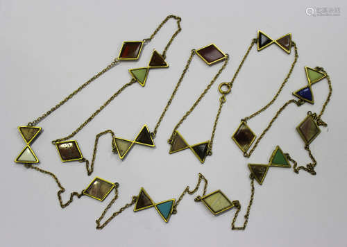A Victorian gilt metal mounted vari-coloured paste imitating agate long chain, mounted with a