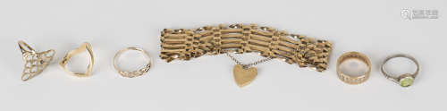 A gold gatelink bracelet on a 9ct gold heart shaped padlock clasp, together with four 9ct gold rings