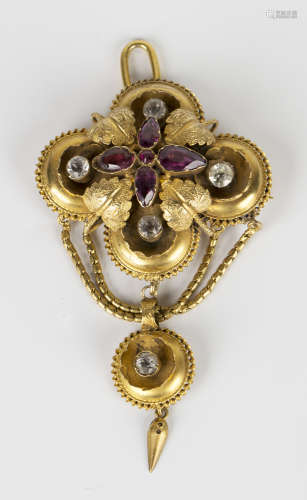 A Victorian gold, garnet and colourless gem set pendant brooch in a foliate and quatrefoil design