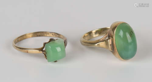 A 9ct gold ring, collet set with an oval chrysoprase, ring size approx K1/2, and a 9ct gold and