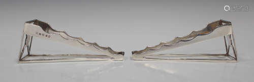 A pair of rare George III silver dish wedges of open triangular form with stepped sides, each bright