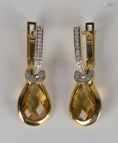A pair of 18ct gold, citrine and diamond pendant earrings, each diamond set hoop shaped surmount