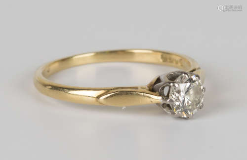 An 18ct gold and diamond single stone ring, claw set with a circular cut diamond, ring size approx