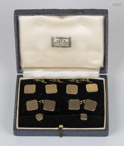 A 9ct two-colour gold evening wear dress set, comprising a pair of cufflinks, a set of four