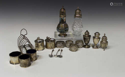 A group of silver items, including a six-division toast rack, Sheffield 1921, two pairs of silver
