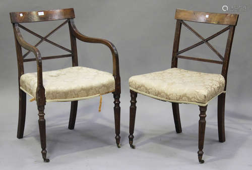 A set of five late 19th century mahogany bar back dining chairs, the overstuffed seats raised on